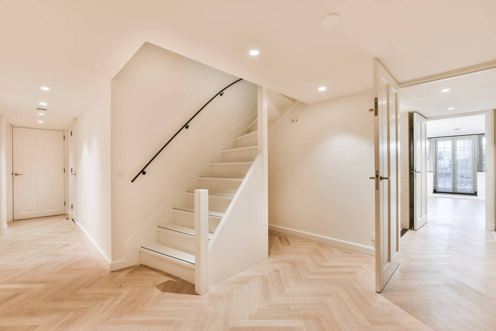 spacious-hall-of-house-with-staircase-basement